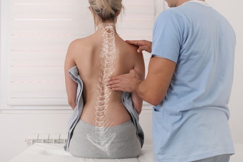 Women on spinal decompression machine